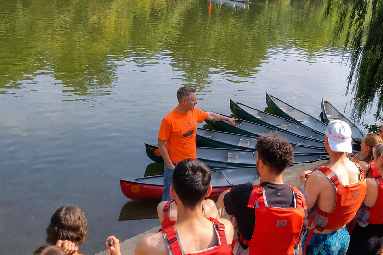 YOFI Paddlesports guide briefing a group before a half day canoe trip