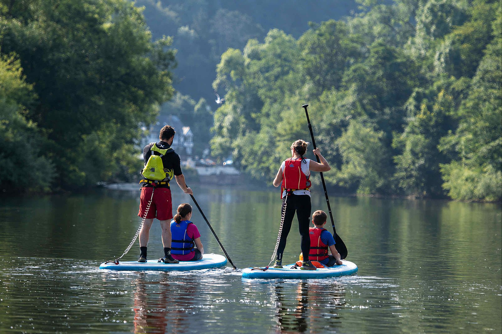 Group of paddlers on inflatable paddle boards on the River Wye